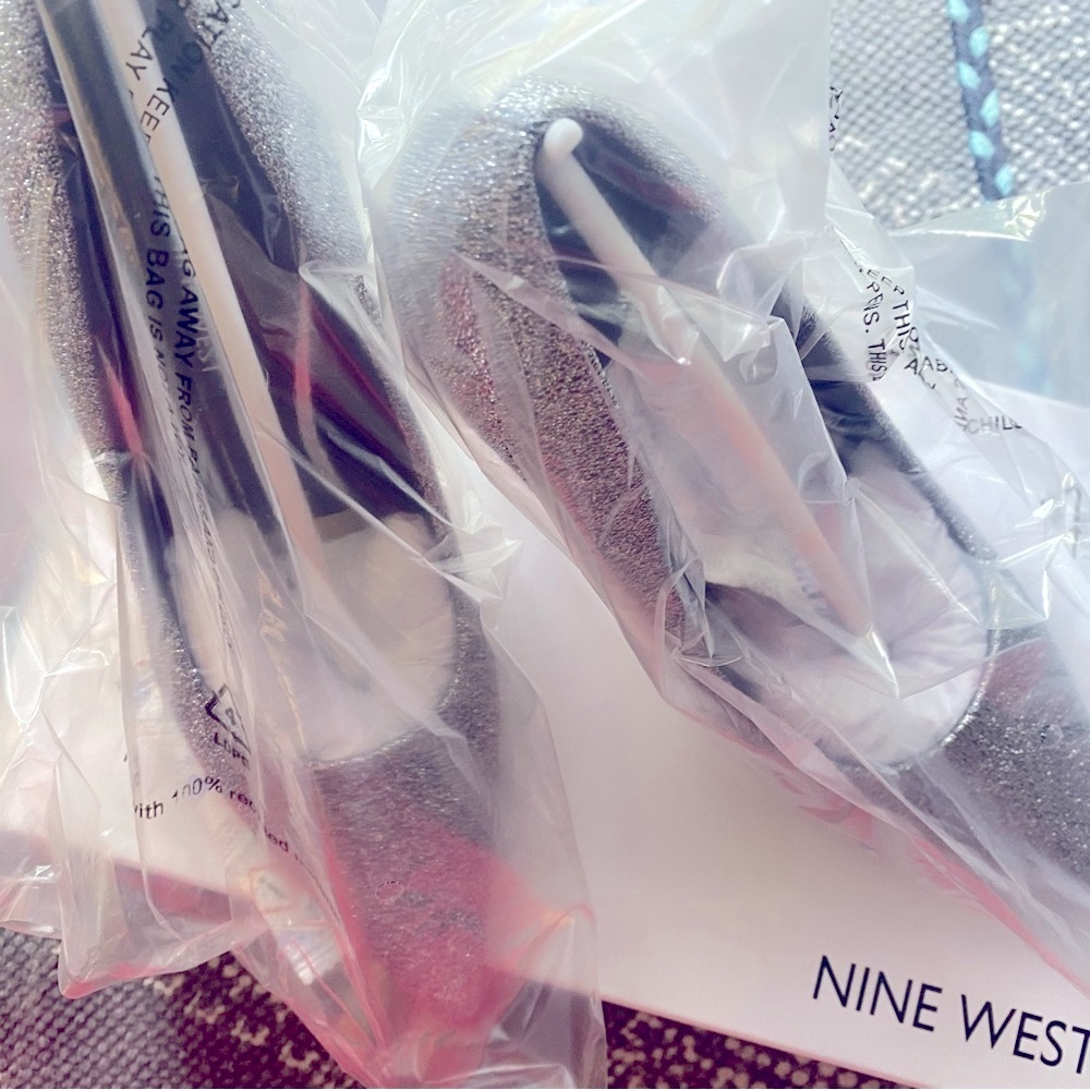 Nine West silver glitter dress heels.